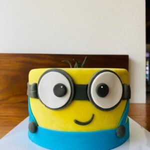 b2d16721-80ea-4aaa-b97a-cb11b1e98a9d Jerry Minion Cake - 2.3Kg Ribbon Cake